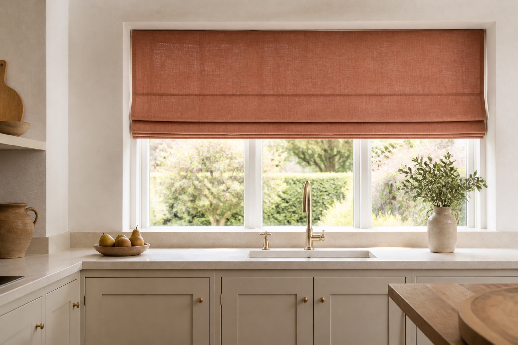 Roman blind adding colour above a kitchen window